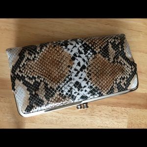 Snake skin print clutch